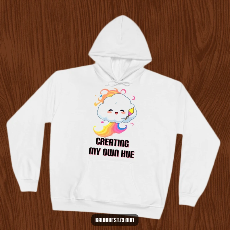 Funny Hoodie featuring a happy cloud mascot actively painting a beautiful, colorful sky with swirling paint.